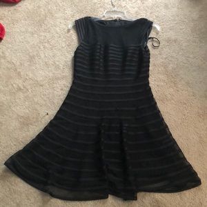 Black mesh dress with “stripes” of fabric